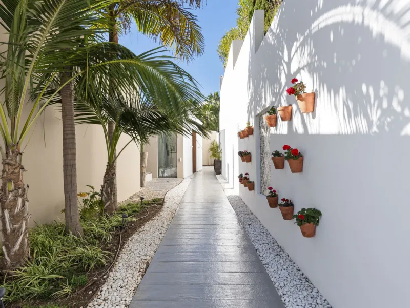This property stands out as a true gem among modern, luxurious villas, gracefully placed in the exclusive gated community of El Herrojo in the esteemed locale of La Quinta. Elegantly perched atop a captivating hill, this exquisite residence offers a capti