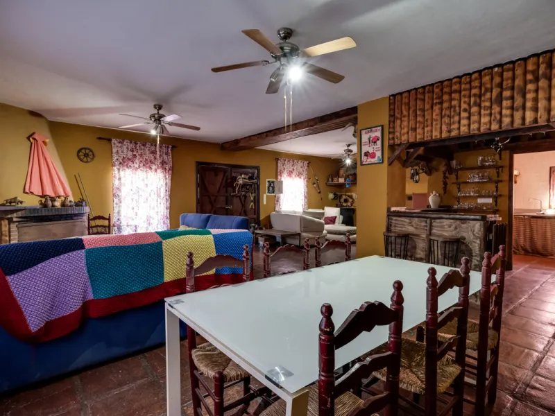 COUNTRY HOUSE in MONDA - Country house with pool, covered porch. On ground floor living/dining room, fitted kitchen, bathrooms, store room, 4 bedrooms. An external staircase leads to the upper floor with living room, office, 2 bedrooms, bathroom and stora