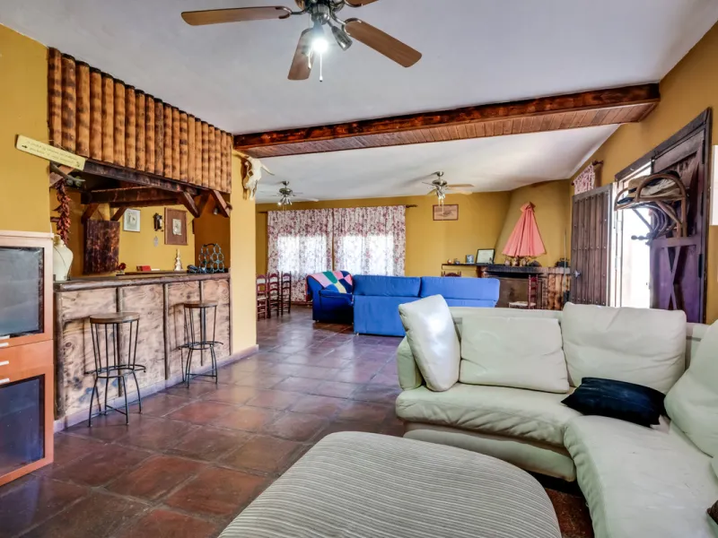 COUNTRY HOUSE in MONDA - Country house with pool, covered porch. On ground floor living/dining room, fitted kitchen, bathrooms, store room, 4 bedrooms. An external staircase leads to the upper floor with living room, office, 2 bedrooms, bathroom and stora