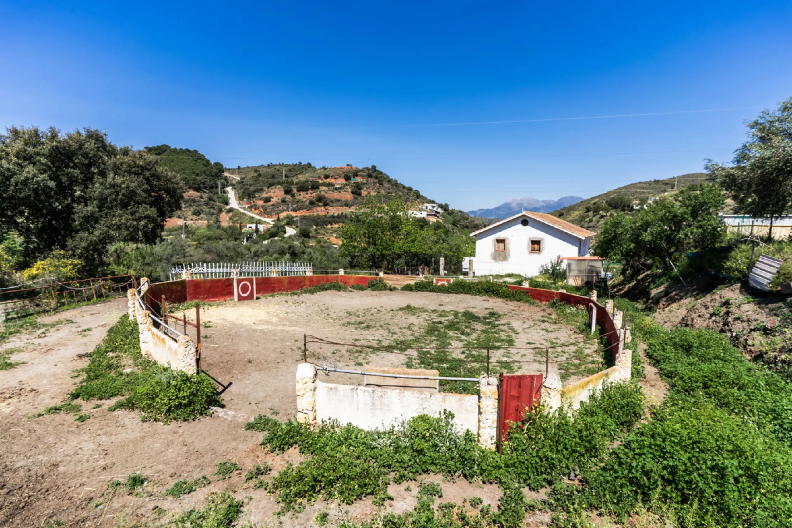 COUNTRY HOUSE in MONDA - Country house with pool, covered porch. On ground floor living/dining room, fitted kitchen, bathrooms, store room, 4 bedrooms. An external staircase leads to the upper floor with living room, office, 2 bedrooms, bathroom and stora
