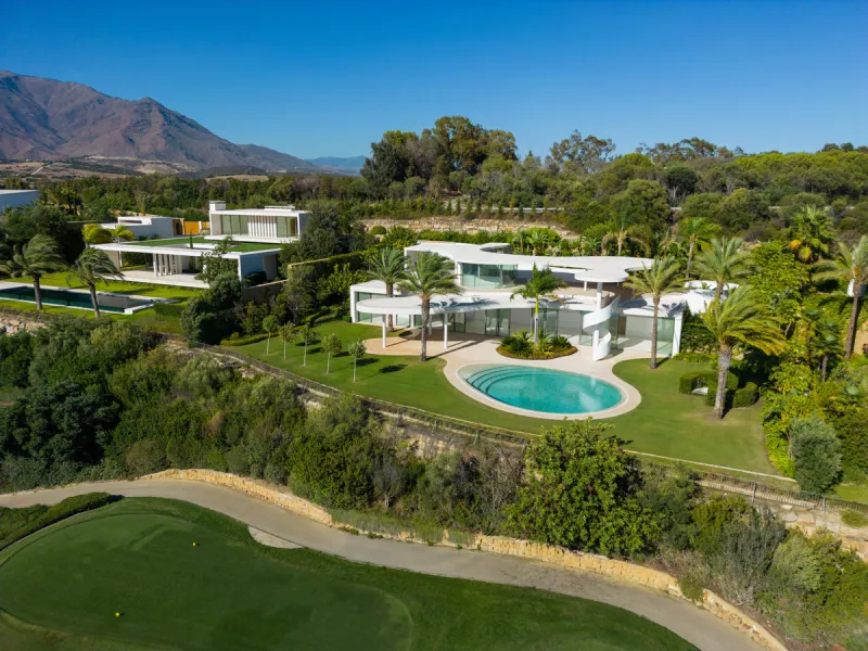 This prestigious villa stands as a testament to architectural ingenuity, capturing the essence of uniqueness and sophistication. Designed by the visionary minds of Vicens & Ramos architects, its futuristic yet nostalgic structure commands attention with i
