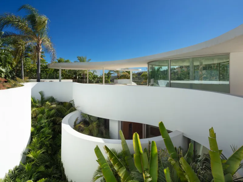 This prestigious villa stands as a testament to architectural ingenuity, capturing the essence of uniqueness and sophistication. Designed by the visionary minds of Vicens & Ramos architects, its futuristic yet nostalgic structure commands attention with i