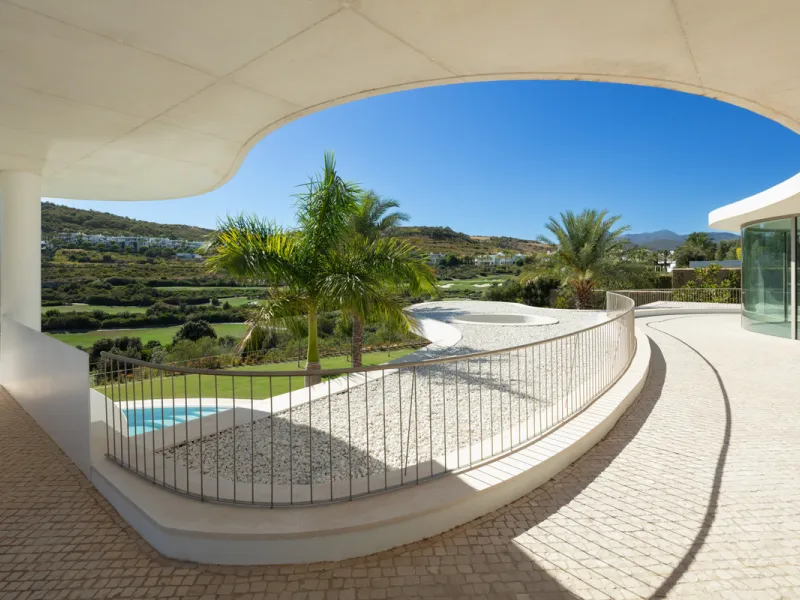 This prestigious villa stands as a testament to architectural ingenuity, capturing the essence of uniqueness and sophistication. Designed by the visionary minds of Vicens & Ramos architects, its futuristic yet nostalgic structure commands attention with i