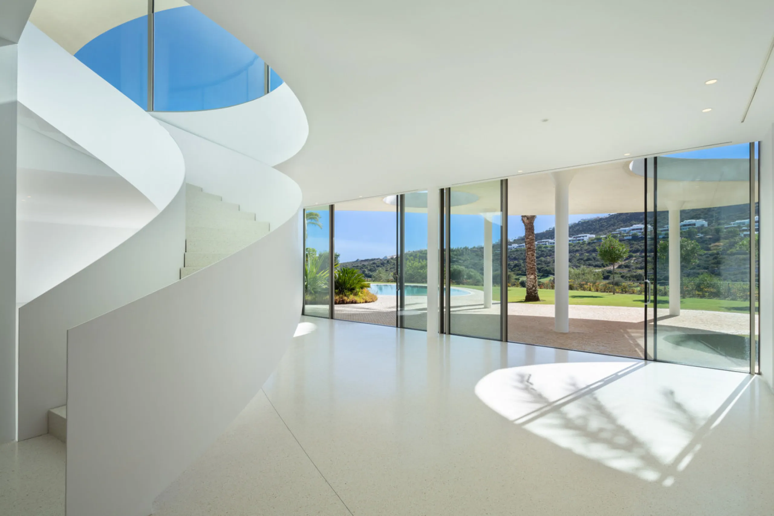 This prestigious villa stands as a testament to architectural ingenuity, capturing the essence of uniqueness and sophistication. Designed by the visionary minds of Vicens & Ramos architects, its futuristic yet nostalgic structure commands attention with i
