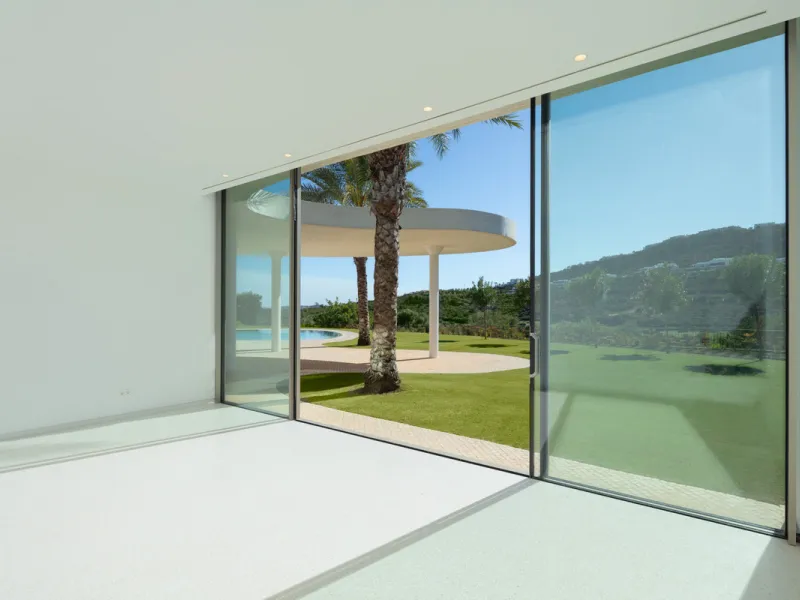This prestigious villa stands as a testament to architectural ingenuity, capturing the essence of uniqueness and sophistication. Designed by the visionary minds of Vicens & Ramos architects, its futuristic yet nostalgic structure commands attention with i