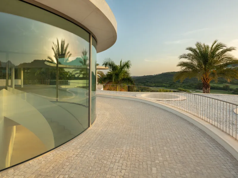 This prestigious villa stands as a testament to architectural ingenuity, capturing the essence of uniqueness and sophistication. Designed by the visionary minds of Vicens & Ramos architects, its futuristic yet nostalgic structure commands attention with i