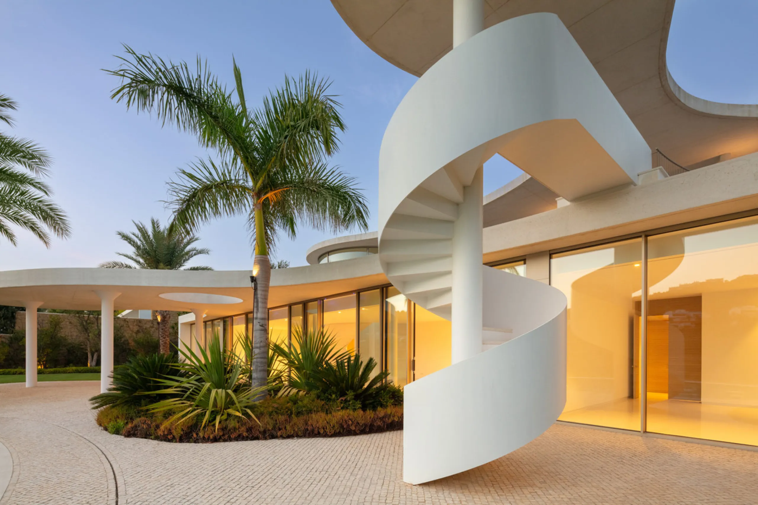 This prestigious villa stands as a testament to architectural ingenuity, capturing the essence of uniqueness and sophistication. Designed by the visionary minds of Vicens & Ramos architects, its futuristic yet nostalgic structure commands attention with i
