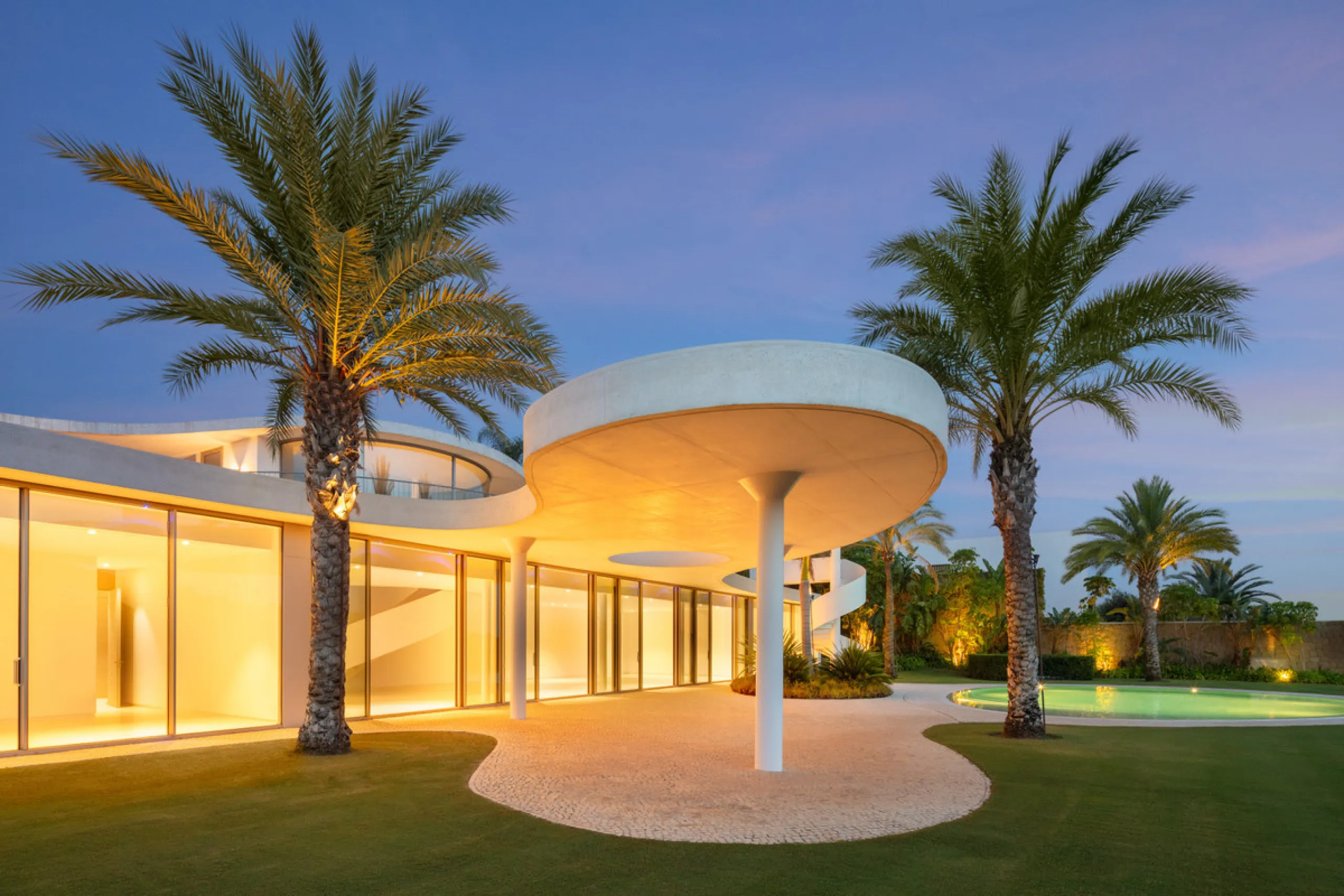 This prestigious villa stands as a testament to architectural ingenuity, capturing the essence of uniqueness and sophistication. Designed by the visionary minds of Vicens & Ramos architects, its futuristic yet nostalgic structure commands attention with i