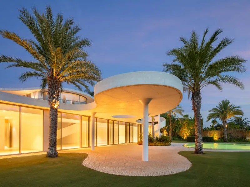 This prestigious villa stands as a testament to architectural ingenuity, capturing the essence of uniqueness and sophistication. Designed by the visionary minds of Vicens & Ramos architects, its futuristic yet nostalgic structure commands attention with i