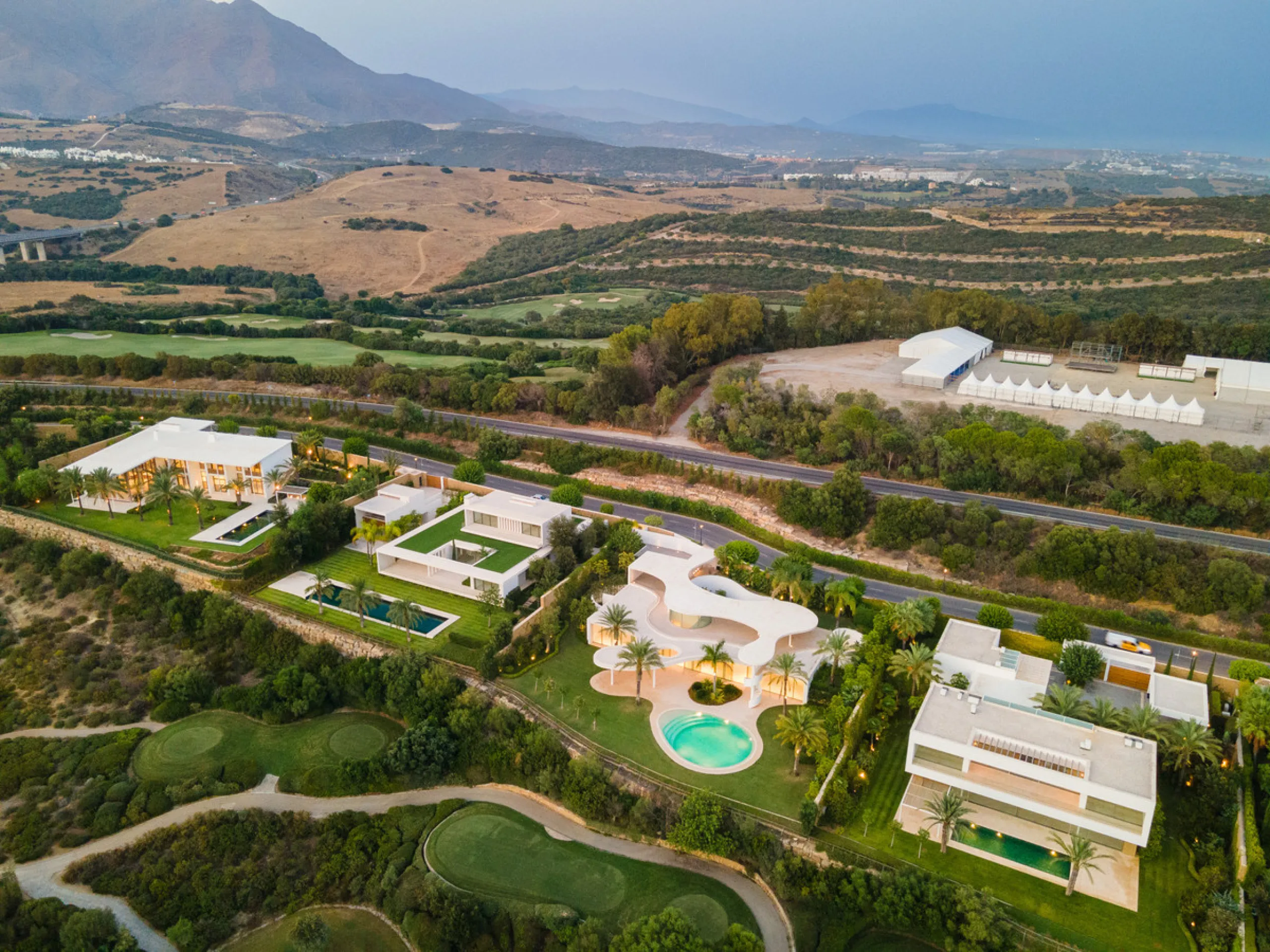 This prestigious villa stands as a testament to architectural ingenuity, capturing the essence of uniqueness and sophistication. Designed by the visionary minds of Vicens & Ramos architects, its futuristic yet nostalgic structure commands attention with i