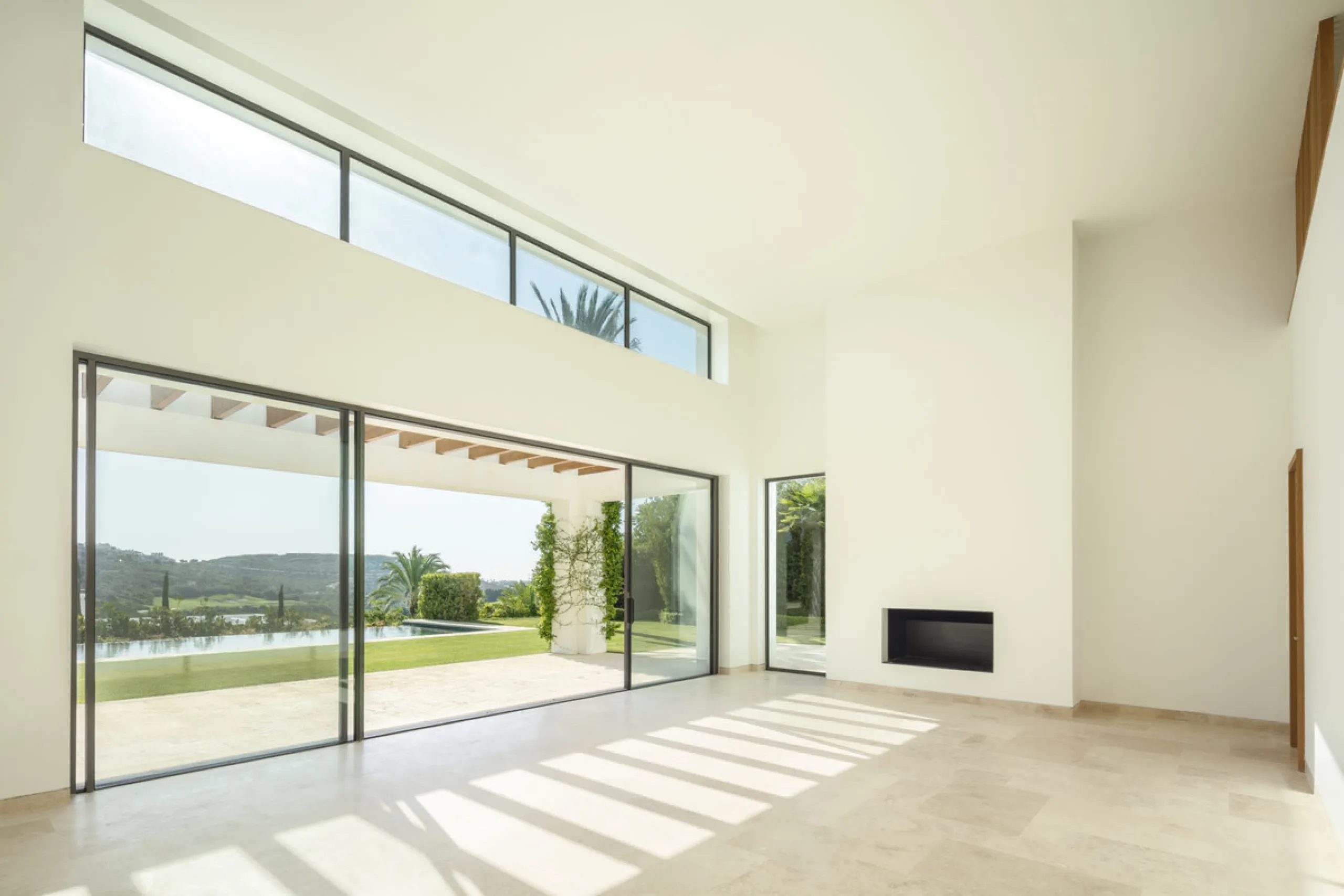 Nestled within the enclave of Green 10 in the Finca Cortesin resort, this villa exudes the charm of Ibiza-style residences. The white structure, adorned with traditional Mediterranean stones, creates a captivating atmosphere for ultimate enjoyment. Set on