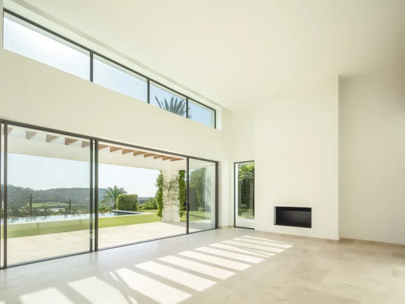 Nestled within the enclave of Green 10 in the Finca Cortesin resort, this villa exudes the charm of Ibiza-style residences. The white structure, adorned with traditional Mediterranean stones, creates a captivating atmosphere for ultimate enjoyment. Set on