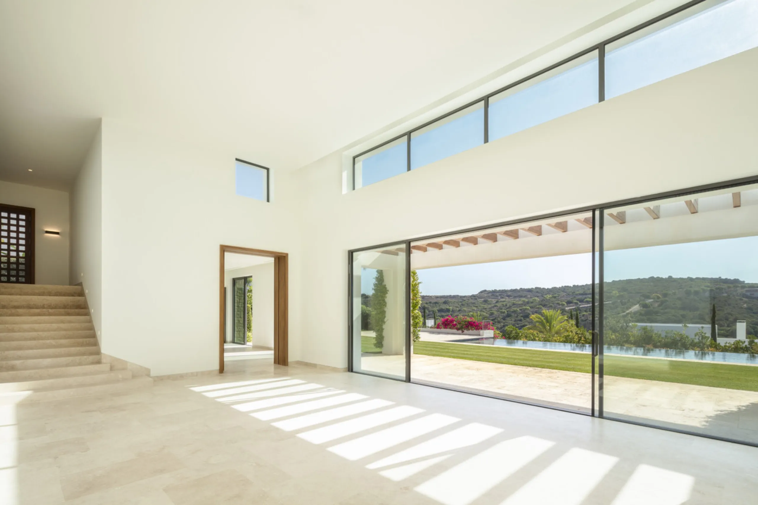Nestled within the enclave of Green 10 in the Finca Cortesin resort, this villa exudes the charm of Ibiza-style residences. The white structure, adorned with traditional Mediterranean stones, creates a captivating atmosphere for ultimate enjoyment. Set on