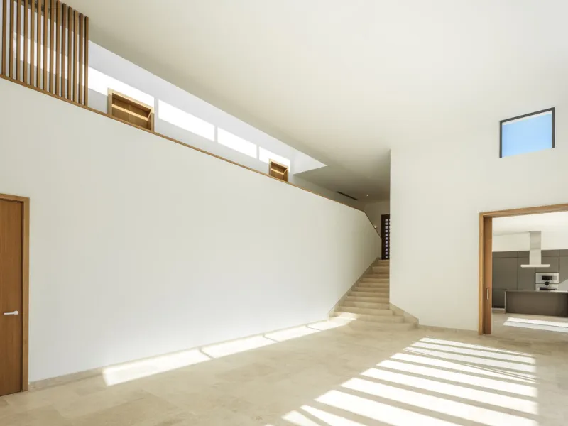Nestled within the enclave of Green 10 in the Finca Cortesin resort, this villa exudes the charm of Ibiza-style residences. The white structure, adorned with traditional Mediterranean stones, creates a captivating atmosphere for ultimate enjoyment. Set on