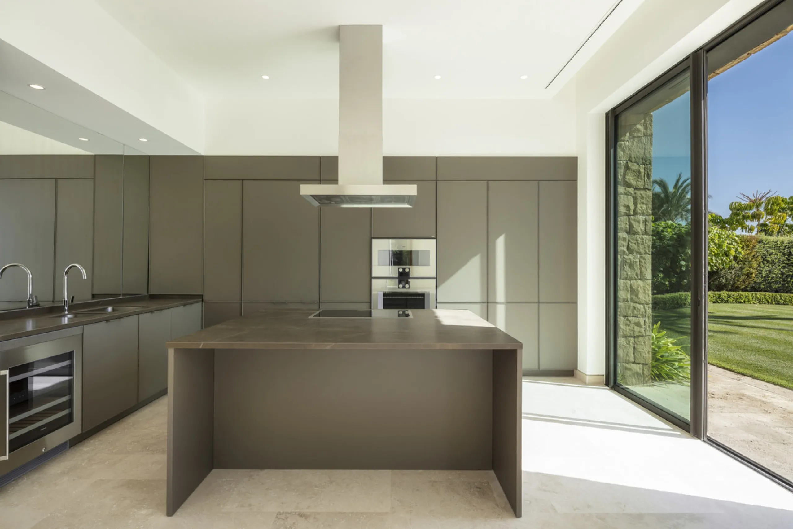 Nestled within the enclave of Green 10 in the Finca Cortesin resort, this villa exudes the charm of Ibiza-style residences. The white structure, adorned with traditional Mediterranean stones, creates a captivating atmosphere for ultimate enjoyment. Set on