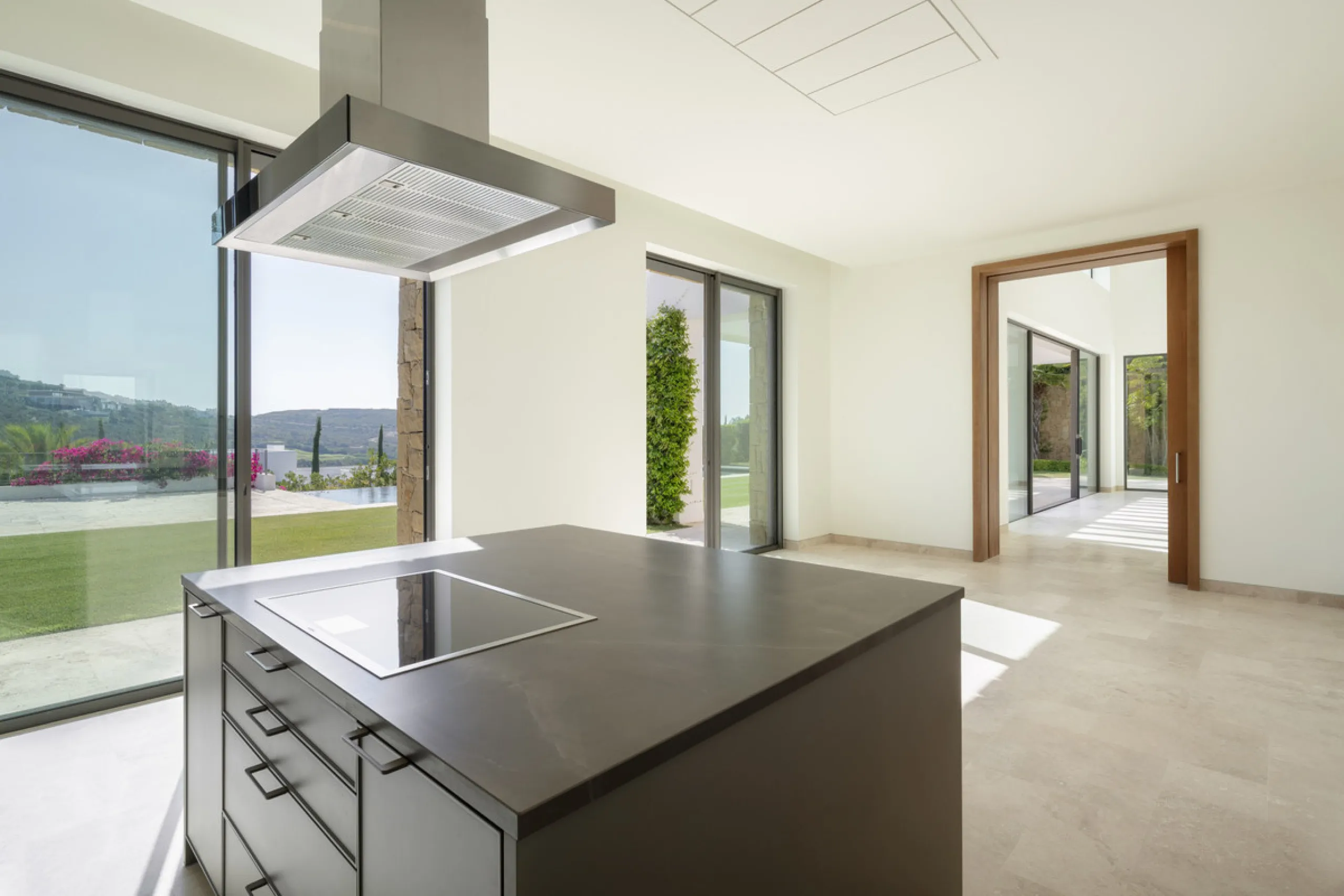 Nestled within the enclave of Green 10 in the Finca Cortesin resort, this villa exudes the charm of Ibiza-style residences. The white structure, adorned with traditional Mediterranean stones, creates a captivating atmosphere for ultimate enjoyment. Set on