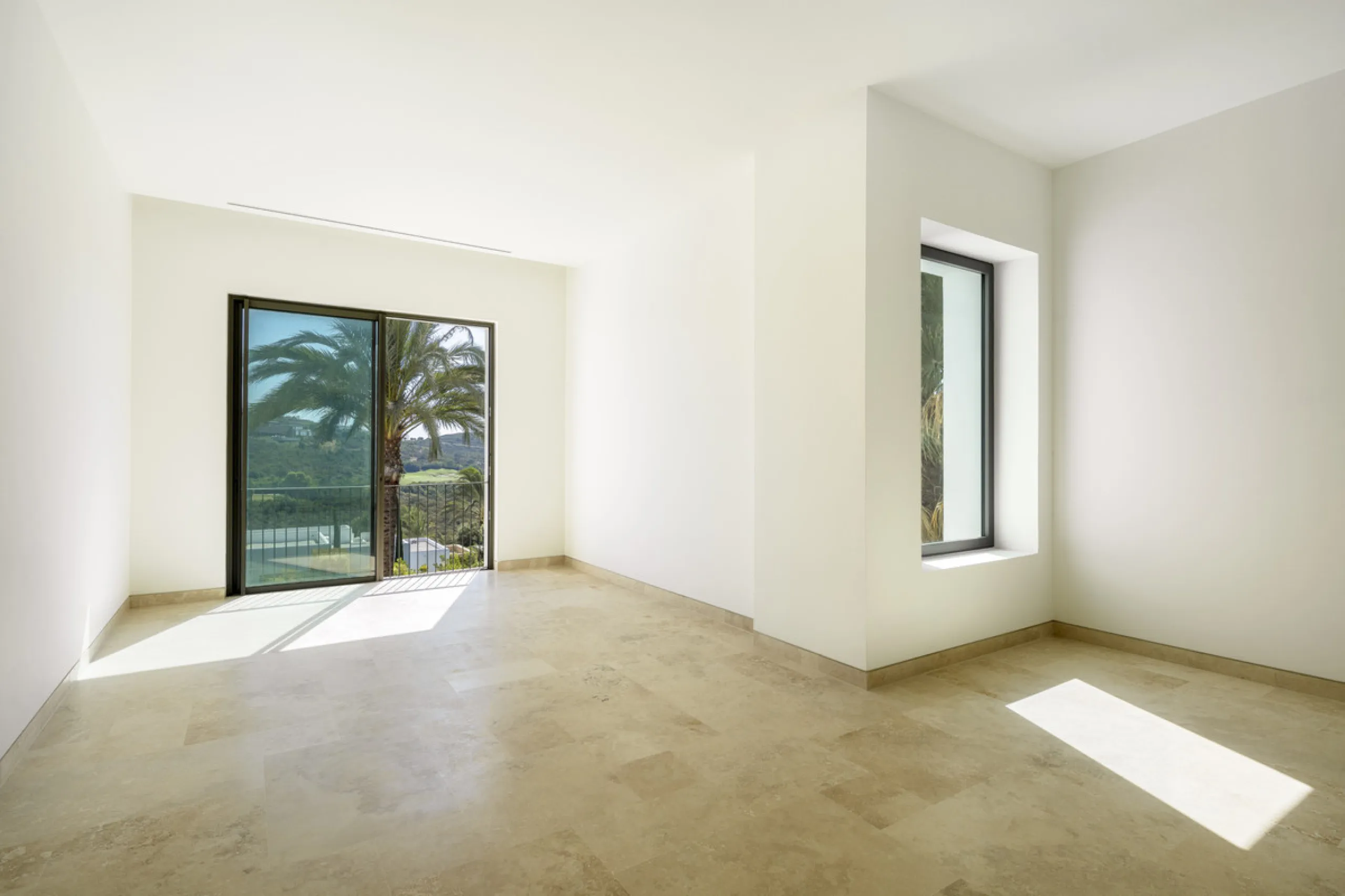 Nestled within the enclave of Green 10 in the Finca Cortesin resort, this villa exudes the charm of Ibiza-style residences. The white structure, adorned with traditional Mediterranean stones, creates a captivating atmosphere for ultimate enjoyment. Set on