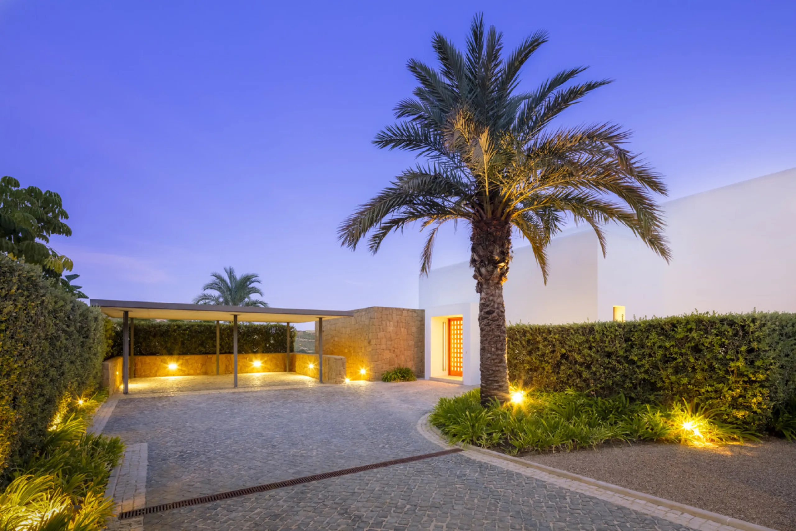 Nestled within the enclave of Green 10 in the Finca Cortesin resort, this villa exudes the charm of Ibiza-style residences. The white structure, adorned with traditional Mediterranean stones, creates a captivating atmosphere for ultimate enjoyment. Set on