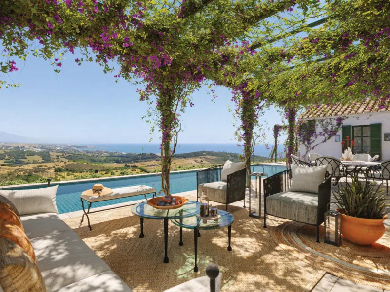 Welcome to a stunning Mediterranean estate nestled within the exclusive gated enclave of La Loma de Cortesin, set within the esteemed Finca Cortesin resort. Designed by renowned architects Torras y Sierra, this captivating residence evokes the charm of tr