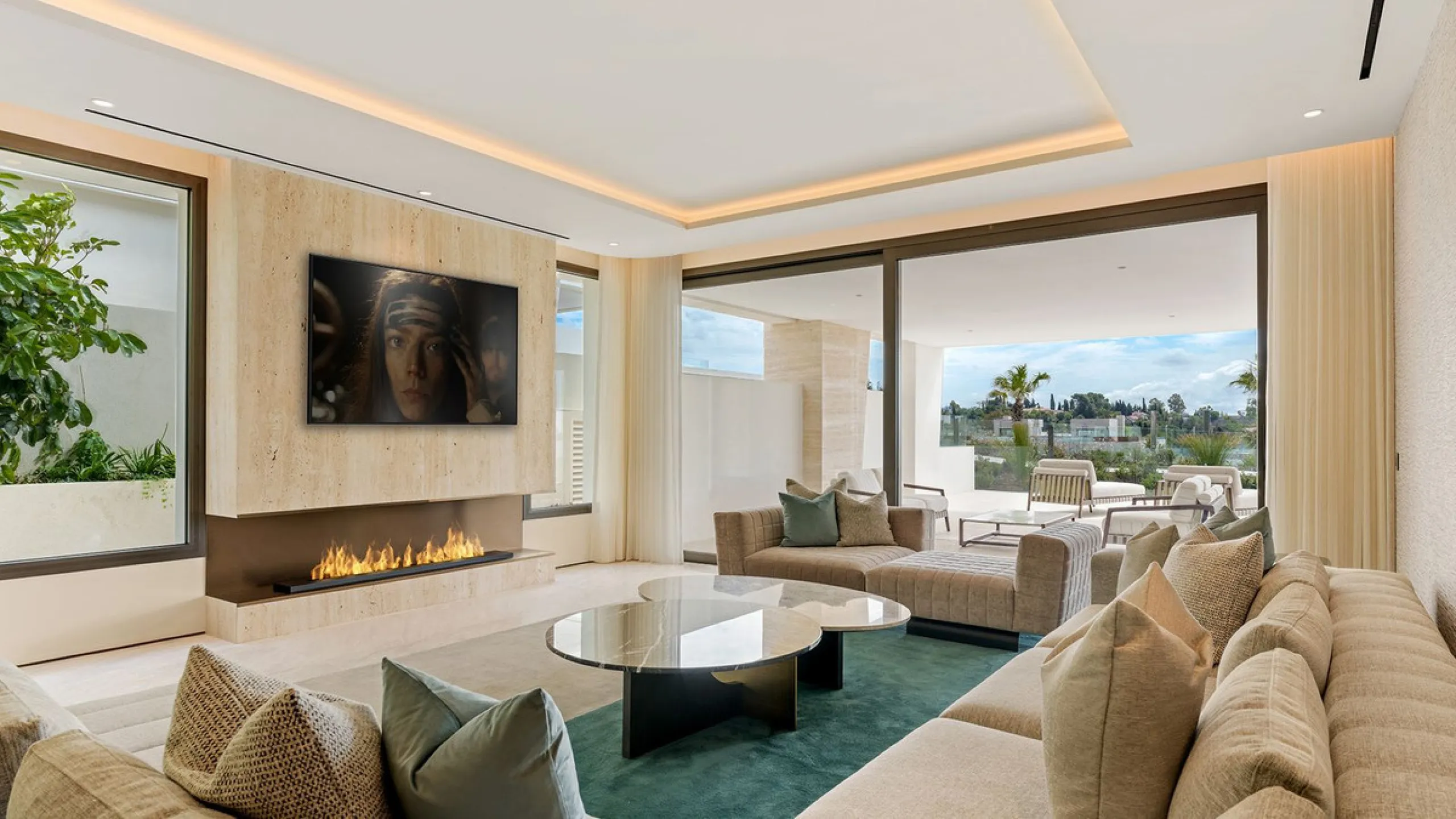 We are pleased to introduce this luxurious ground floor duplex apartment with stunning sea and mountain views in the prestigious EPIC Marbella complex, Phase 2.