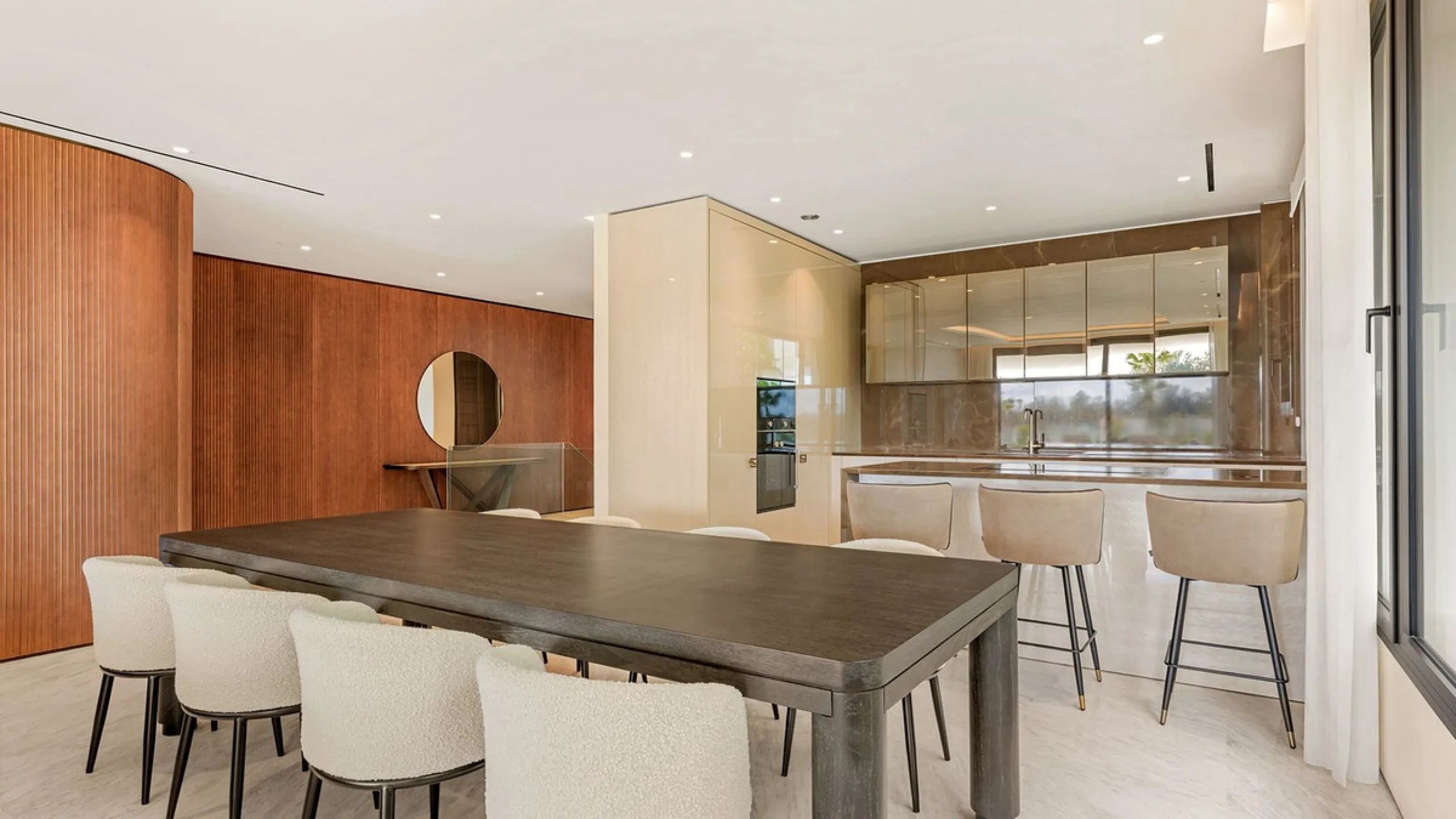 We are pleased to introduce this luxurious ground floor duplex apartment with stunning sea and mountain views in the prestigious EPIC Marbella complex, Phase 2.