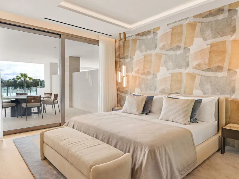 We are pleased to introduce this luxurious ground floor duplex apartment with stunning sea and mountain views in the prestigious EPIC Marbella complex, Phase 2.