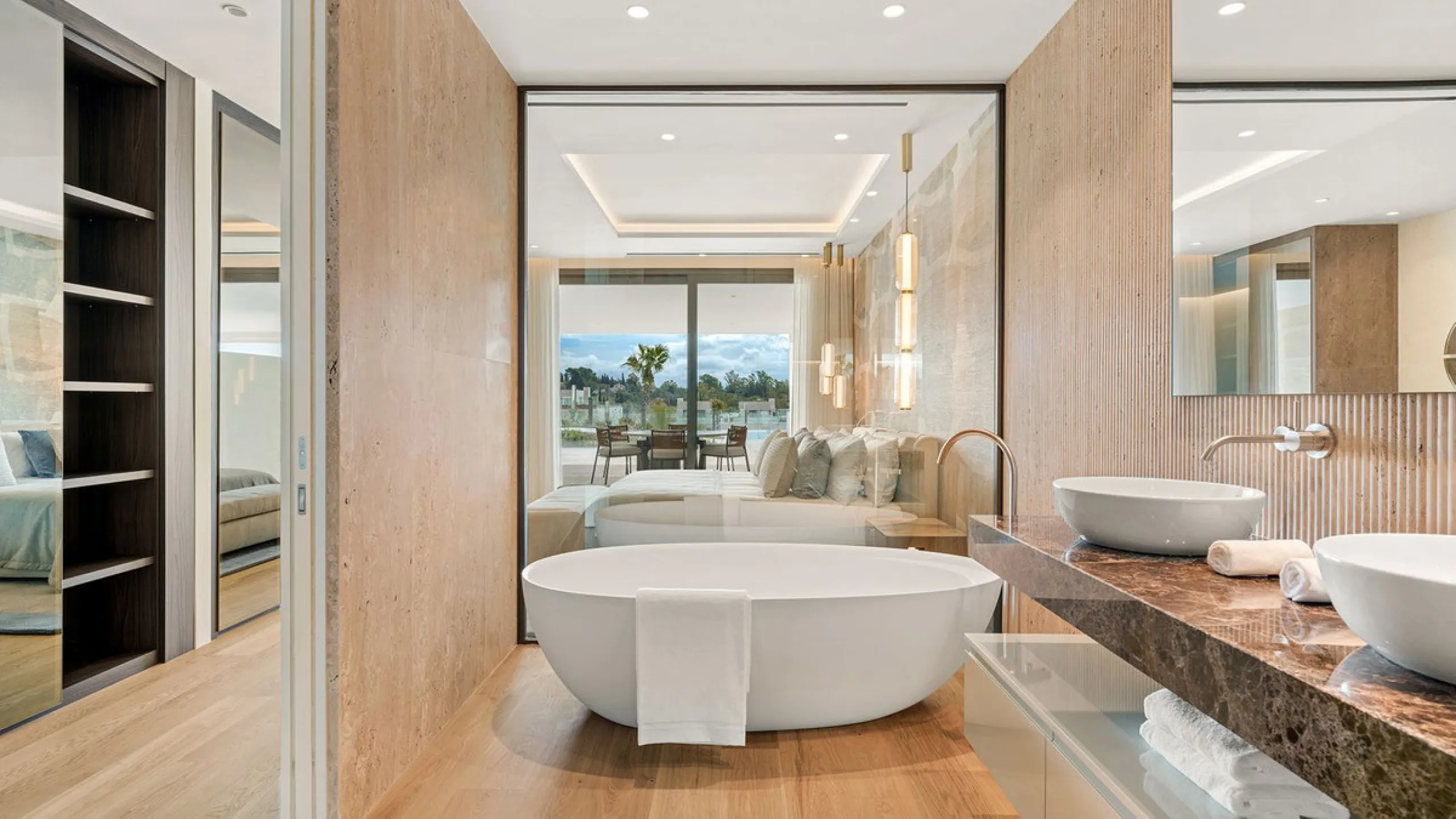 We are pleased to introduce this luxurious ground floor duplex apartment with stunning sea and mountain views in the prestigious EPIC Marbella complex, Phase 2.