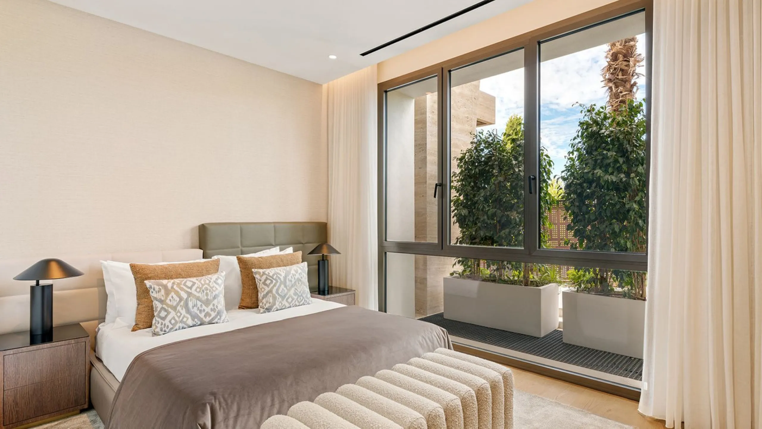 We are pleased to introduce this luxurious ground floor duplex apartment with stunning sea and mountain views in the prestigious EPIC Marbella complex, Phase 2.