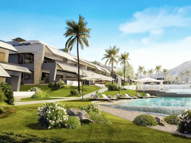 We are pleased to introduce this luxurious ground floor duplex apartment with stunning sea and mountain views in the prestigious EPIC Marbella complex, Phase 2.