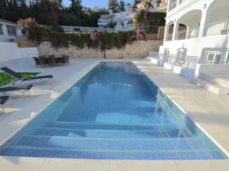 This stunning villa features 6 spacious bedrooms and 5 modern bathrooms, with terraces offering panoramic sea views. Outside, enjoy a beautiful swimming pool, garden, and a large patio area complete with seating perfect for relaxing or hosting barbecues.