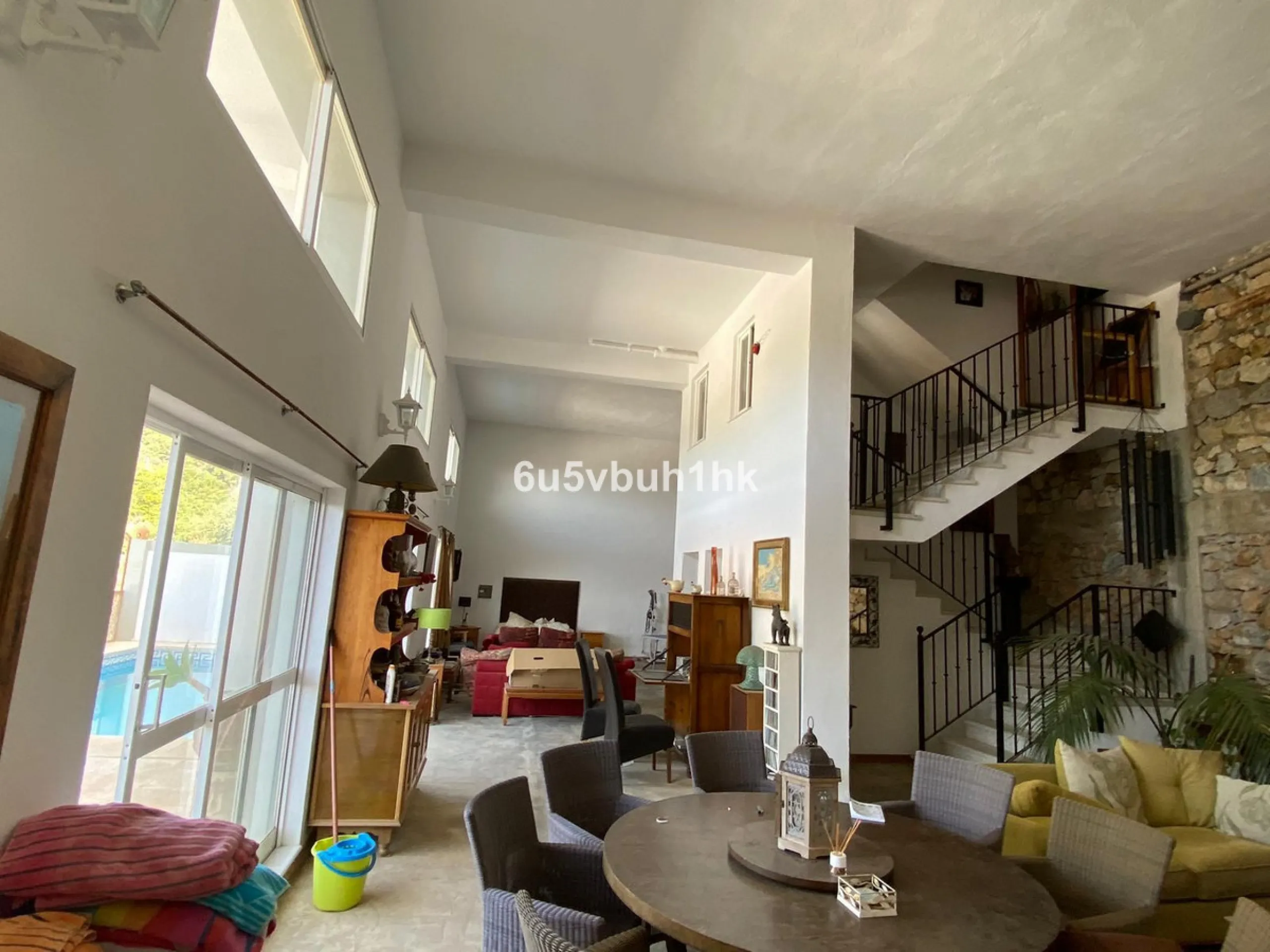 Detached single-family home located in Ojén, distributed over three floors and designed for comfortable and versatile living.