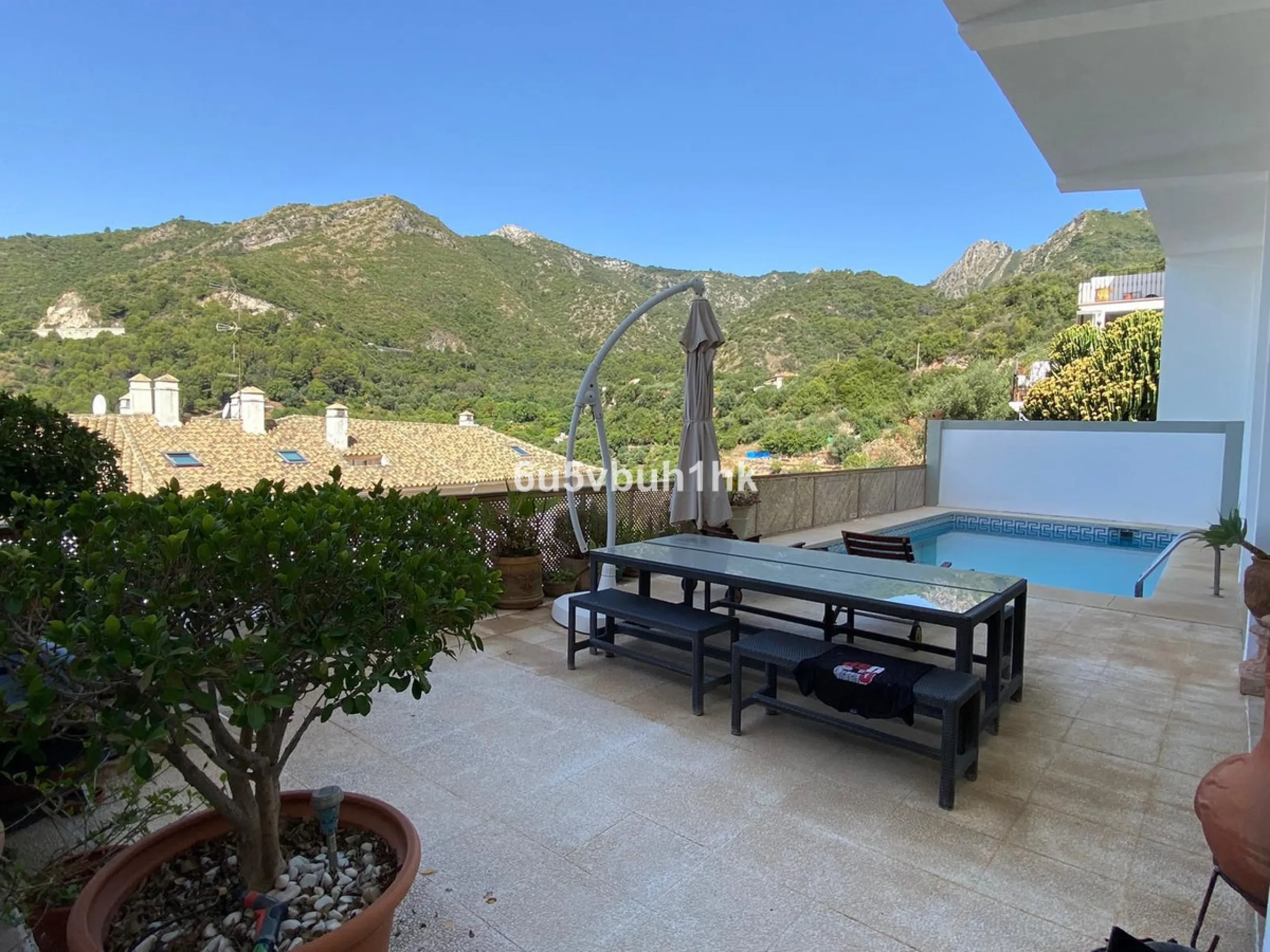 Detached single-family home located in Ojén, distributed over three floors and designed for comfortable and versatile living.