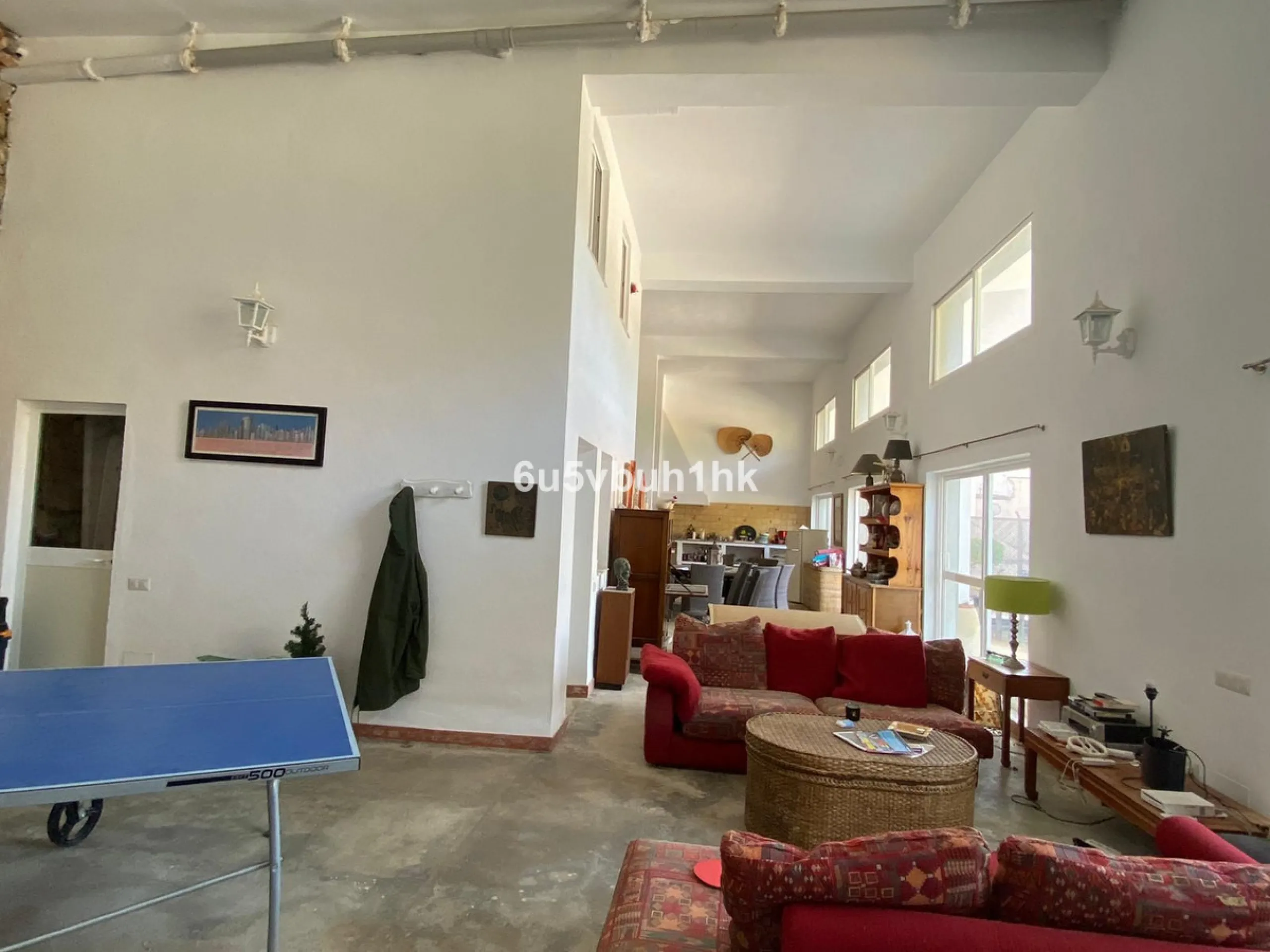 Detached single-family home located in Ojén, distributed over three floors and designed for comfortable and versatile living.