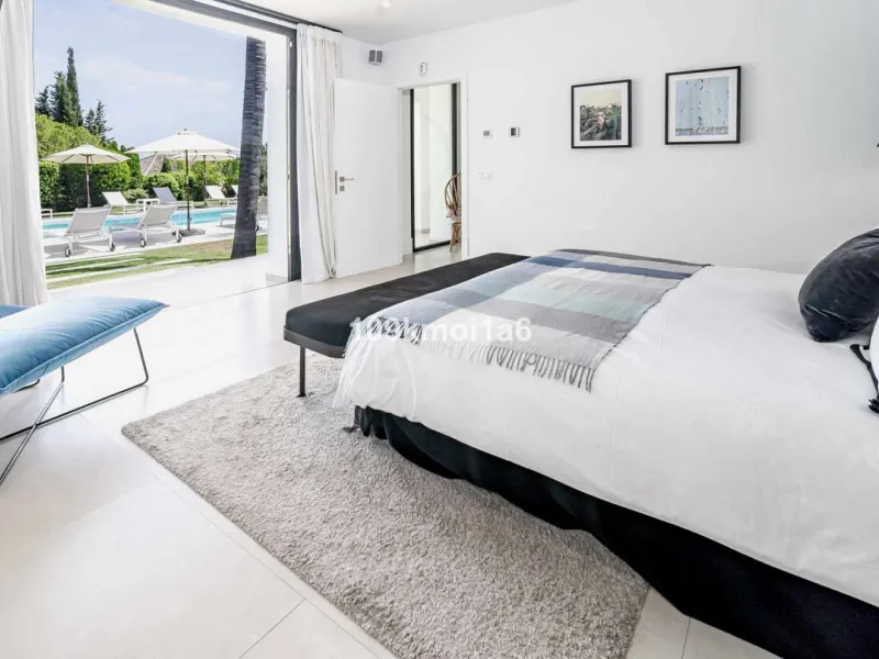 This elegant south east-facing villa is set within a quiet cul-de-sac in Las Brisas, Nueva Andalucía, offering privacy, mature gardens, and open views enhanced by abundant natural light throughout the day. The property blends the charm of a timeless Andal