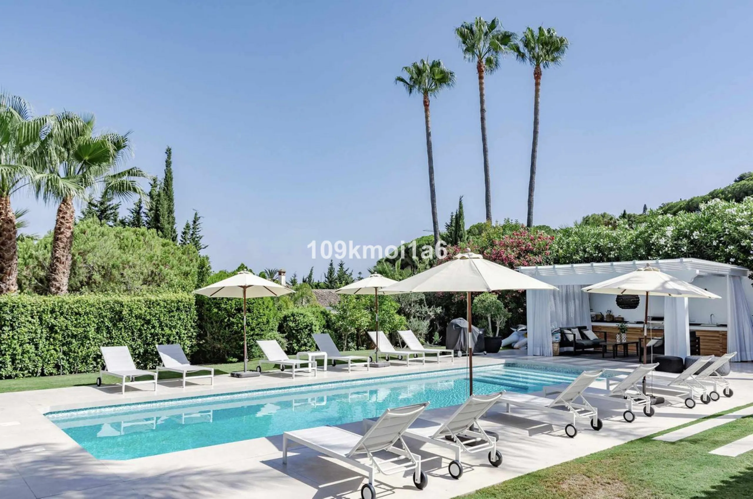 This elegant south east-facing villa is set within a quiet cul-de-sac in Las Brisas, Nueva Andalucía, offering privacy, mature gardens, and open views enhanced by abundant natural light throughout the day. The property blends the charm of a timeless Andal
