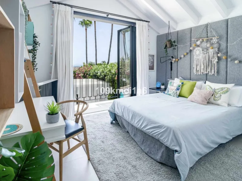 This elegant south east-facing villa is set within a quiet cul-de-sac in Las Brisas, Nueva Andalucía, offering privacy, mature gardens, and open views enhanced by abundant natural light throughout the day. The property blends the charm of a timeless Andal