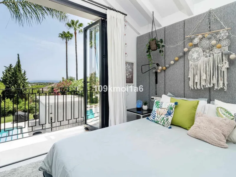 This elegant south east-facing villa is set within a quiet cul-de-sac in Las Brisas, Nueva Andalucía, offering privacy, mature gardens, and open views enhanced by abundant natural light throughout the day. The property blends the charm of a timeless Andal