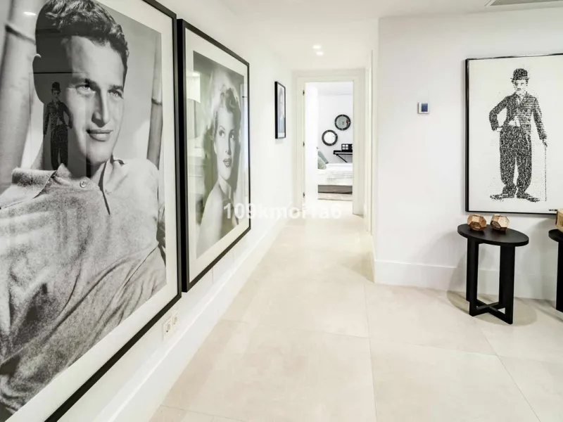 This elegant south east-facing villa is set within a quiet cul-de-sac in Las Brisas, Nueva Andalucía, offering privacy, mature gardens, and open views enhanced by abundant natural light throughout the day. The property blends the charm of a timeless Andal