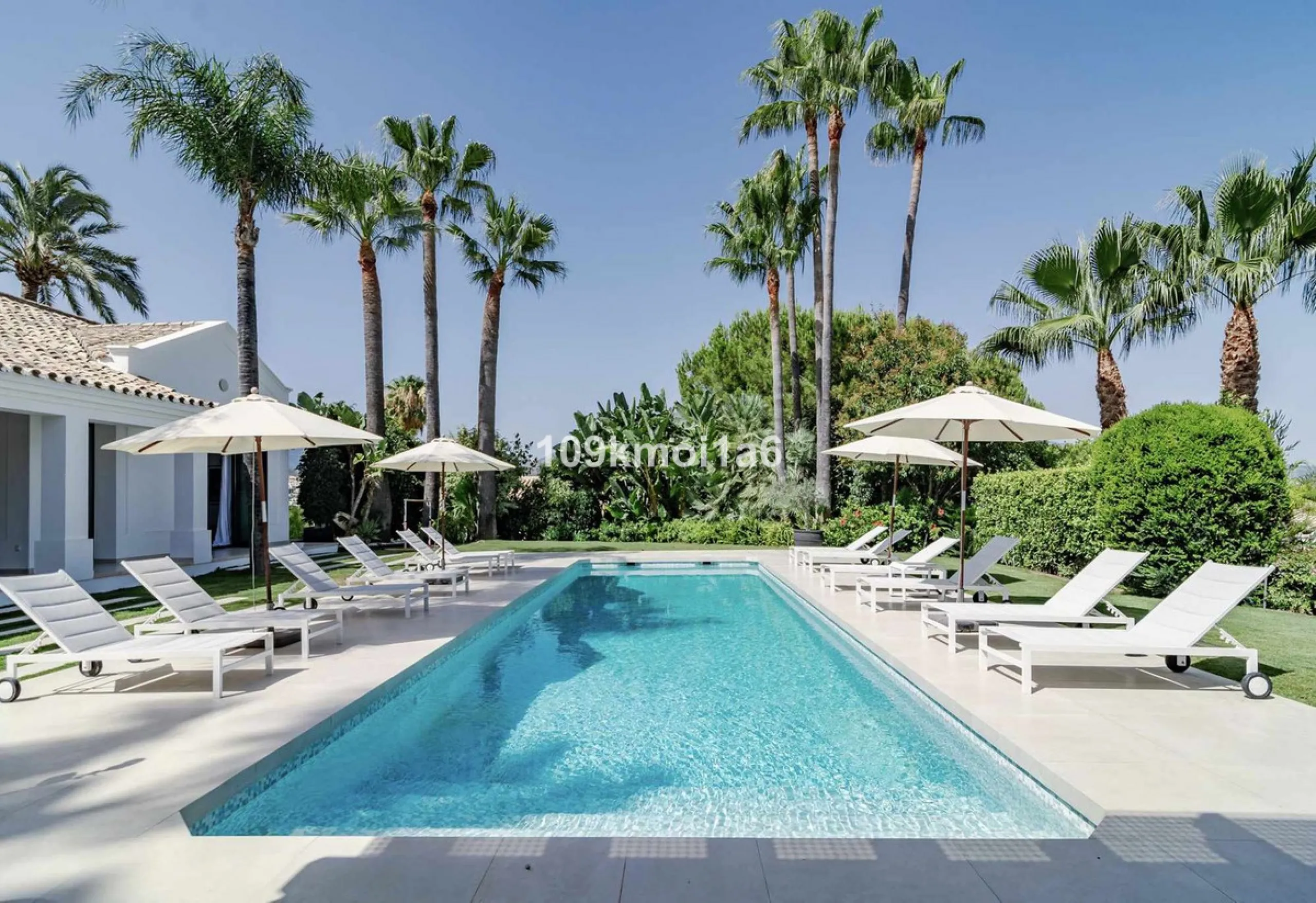 This elegant south east-facing villa is set within a quiet cul-de-sac in Las Brisas, Nueva Andalucía, offering privacy, mature gardens, and open views enhanced by abundant natural light throughout the day. The property blends the charm of a timeless Andal
