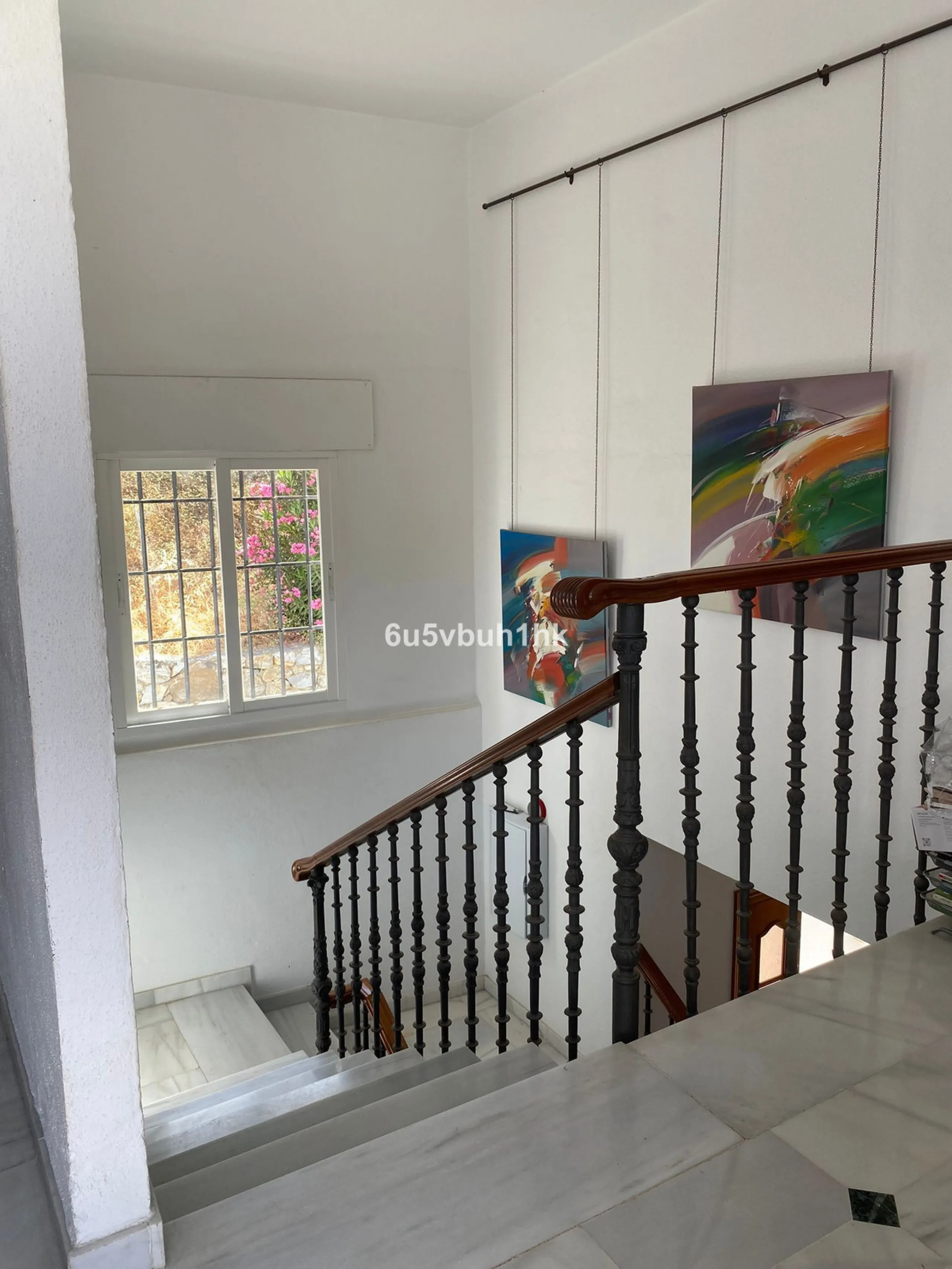 Detached single-family home located in Ojén, distributed over three floors and designed for comfortable and versatile living.