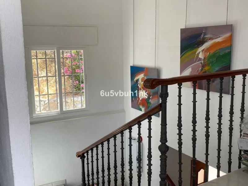 Detached single-family home located in Ojén, distributed over three floors and designed for comfortable and versatile living.