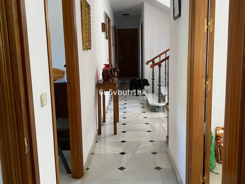 Detached single-family home located in Ojén, distributed over three floors and designed for comfortable and versatile living.