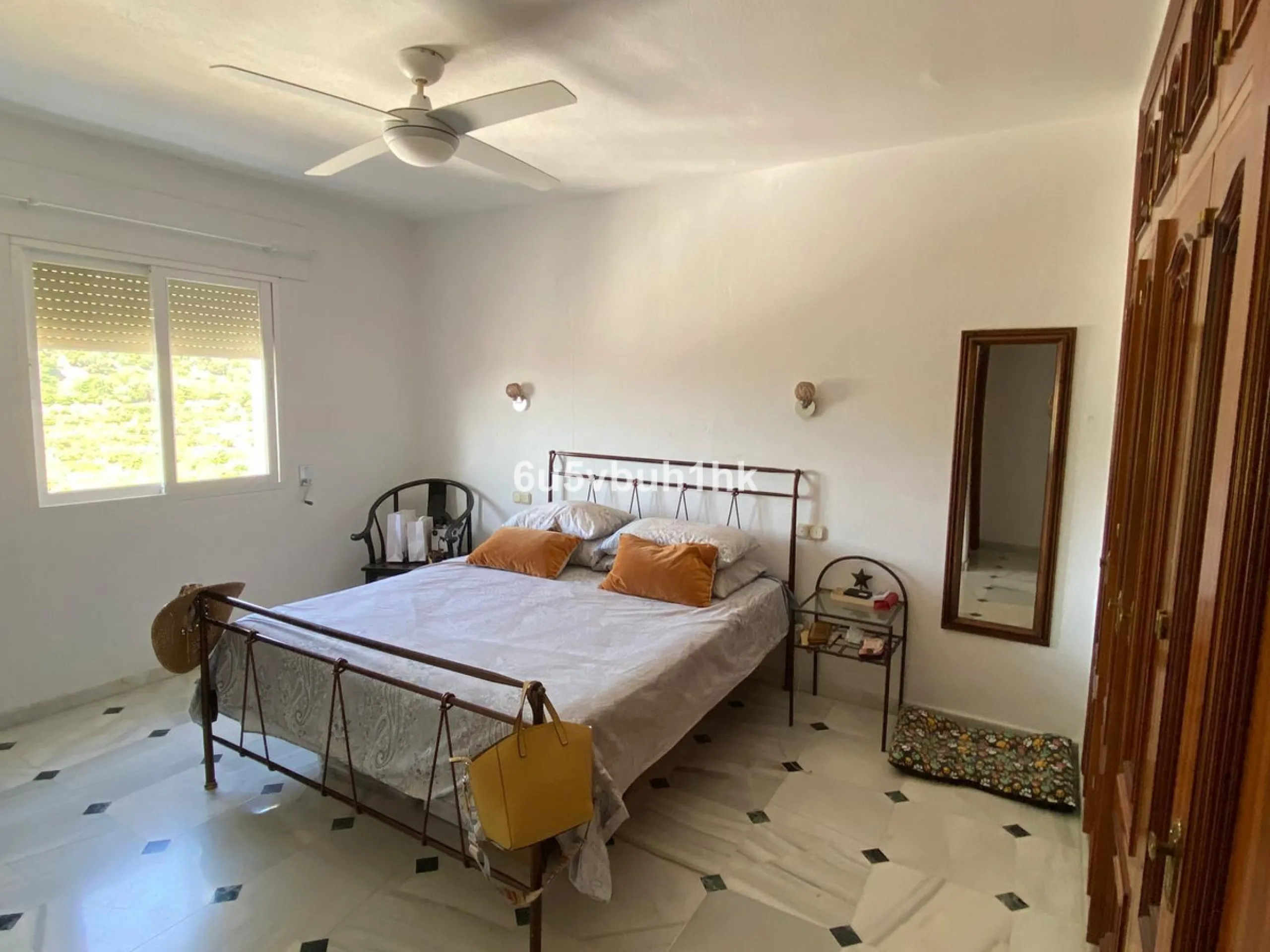 Detached single-family home located in Ojén, distributed over three floors and designed for comfortable and versatile living.