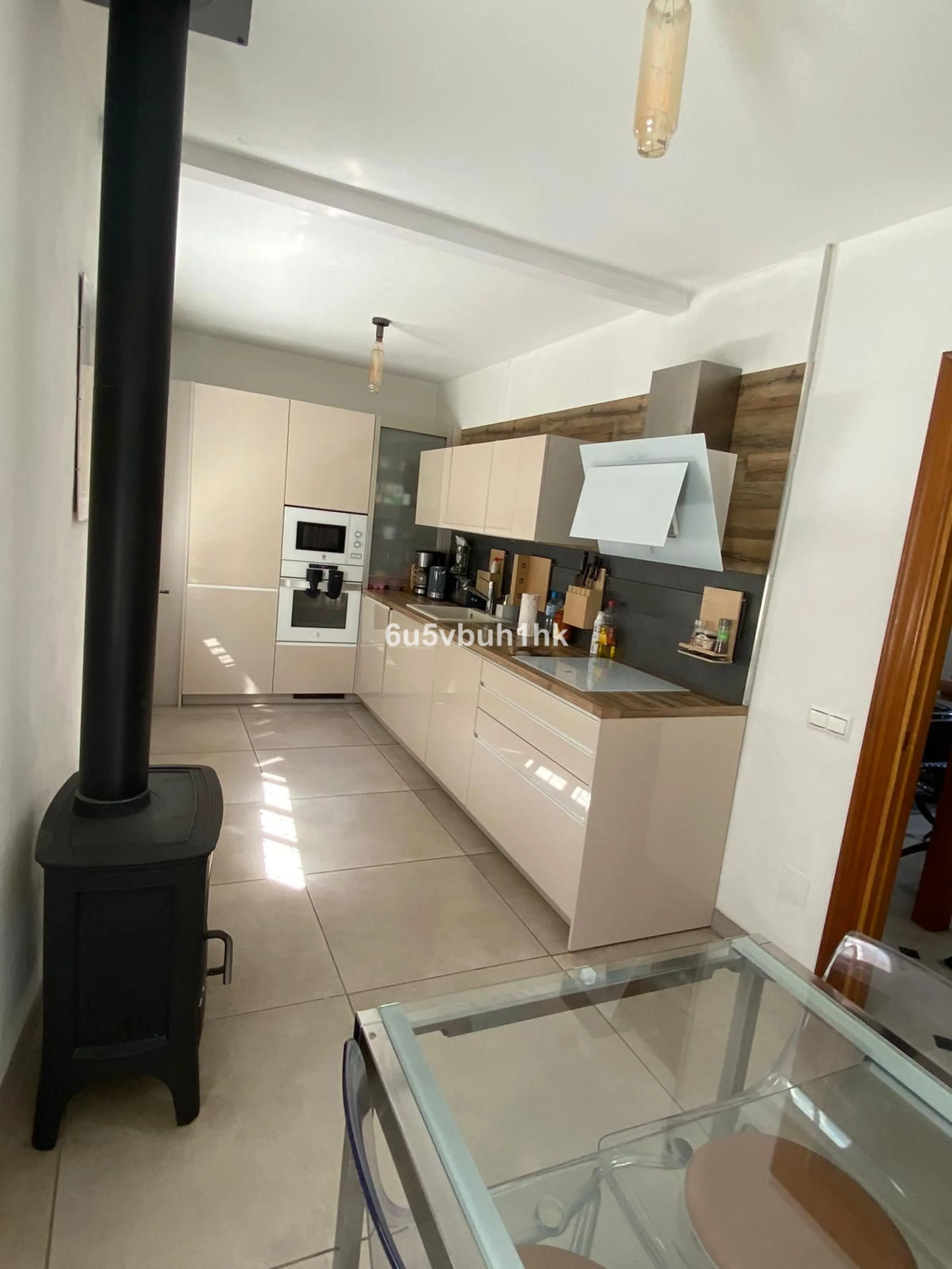 Detached single-family home located in Ojén, distributed over three floors and designed for comfortable and versatile living.