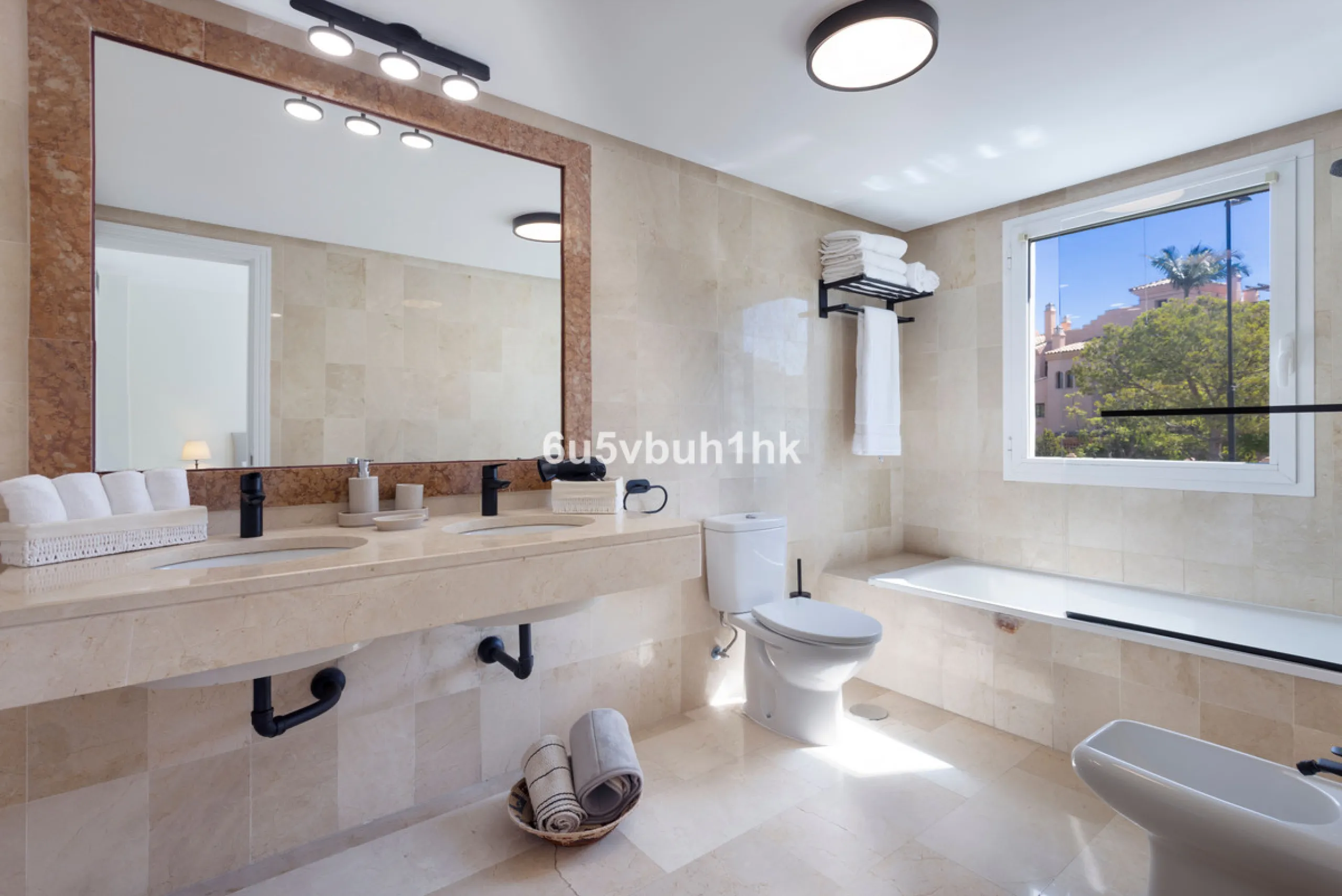 Fully renovated and beautifully presented, this home immediately impresses with a welcoming entrance hall that leads to a spacious, separate kitchen with an adjoining laundry area. From here, you step into a bright and airy open-plan living and dining spa