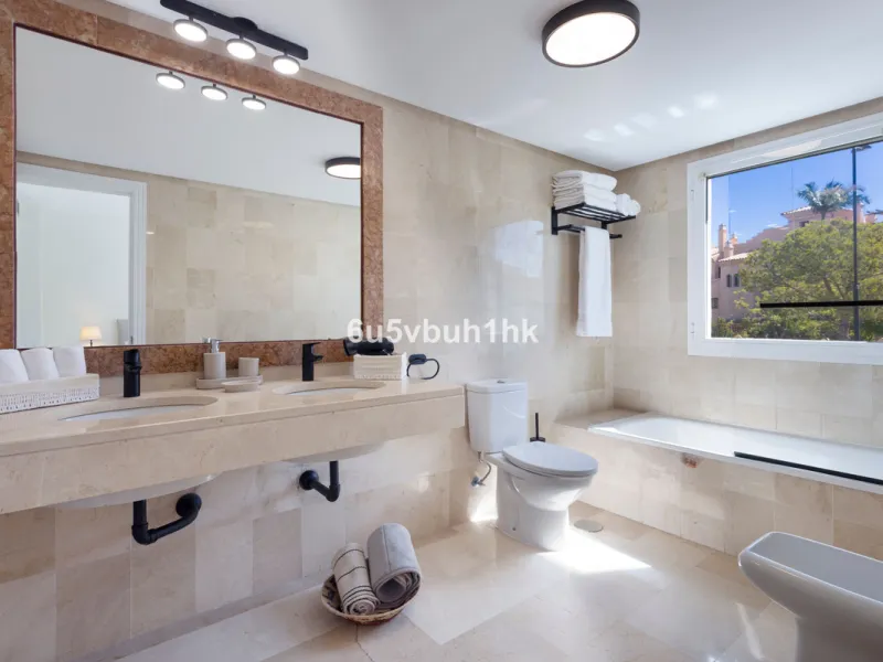 Fully renovated and beautifully presented, this home immediately impresses with a welcoming entrance hall that leads to a spacious, separate kitchen with an adjoining laundry area. From here, you step into a bright and airy open-plan living and dining spa
