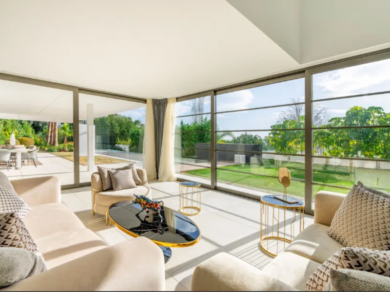 This 4-bedroom eco-friendly villa for sale in La Alqueria, a rapidly emerging area in Benahavis known for its breathtaking natural beauty and significant investment potential. Located on a hill, this property offers parcial sea views lush Andalusian hills