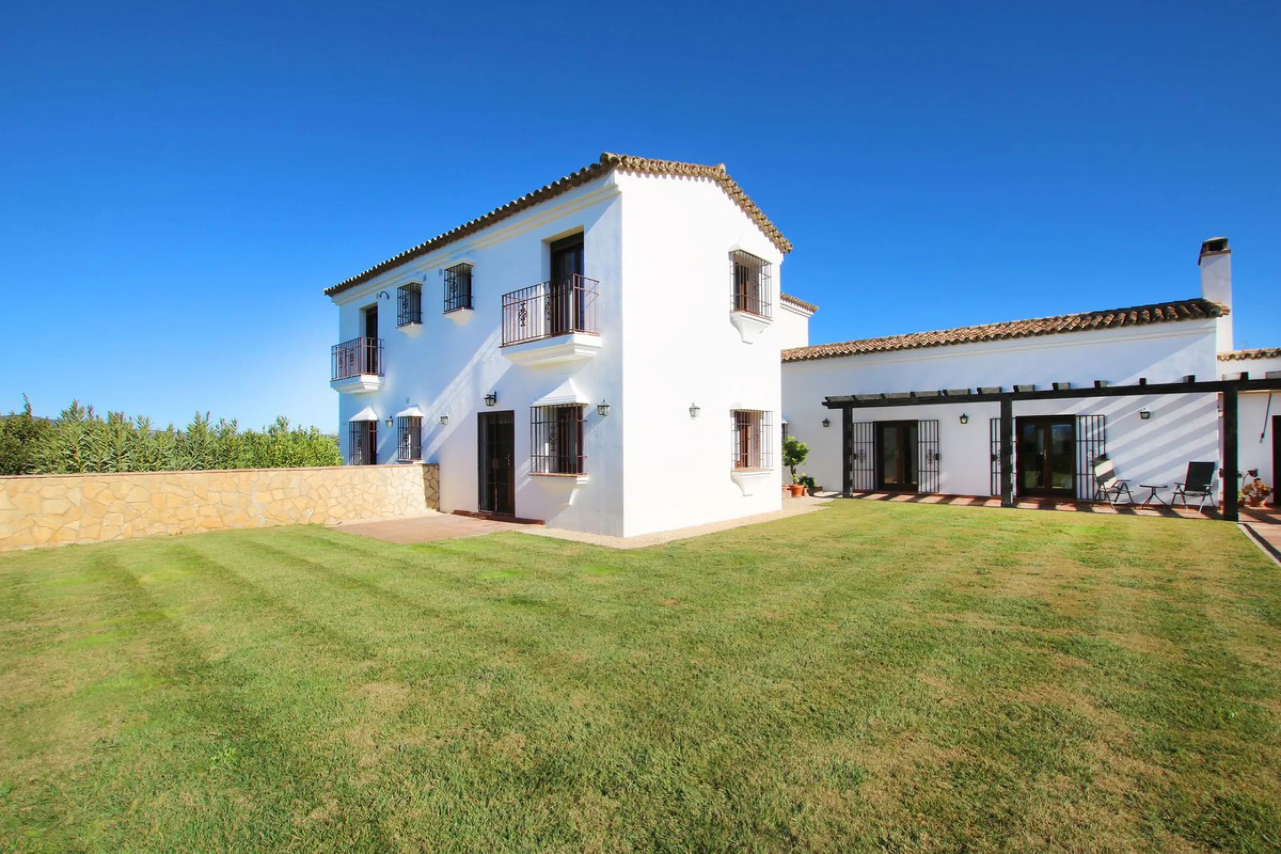 Classical Andalucian inspired country villa situated within the much sort after area of Llano del Cruz just 5 minutes drive outside the vibrant and historic town of Ronda , Southern Spain.