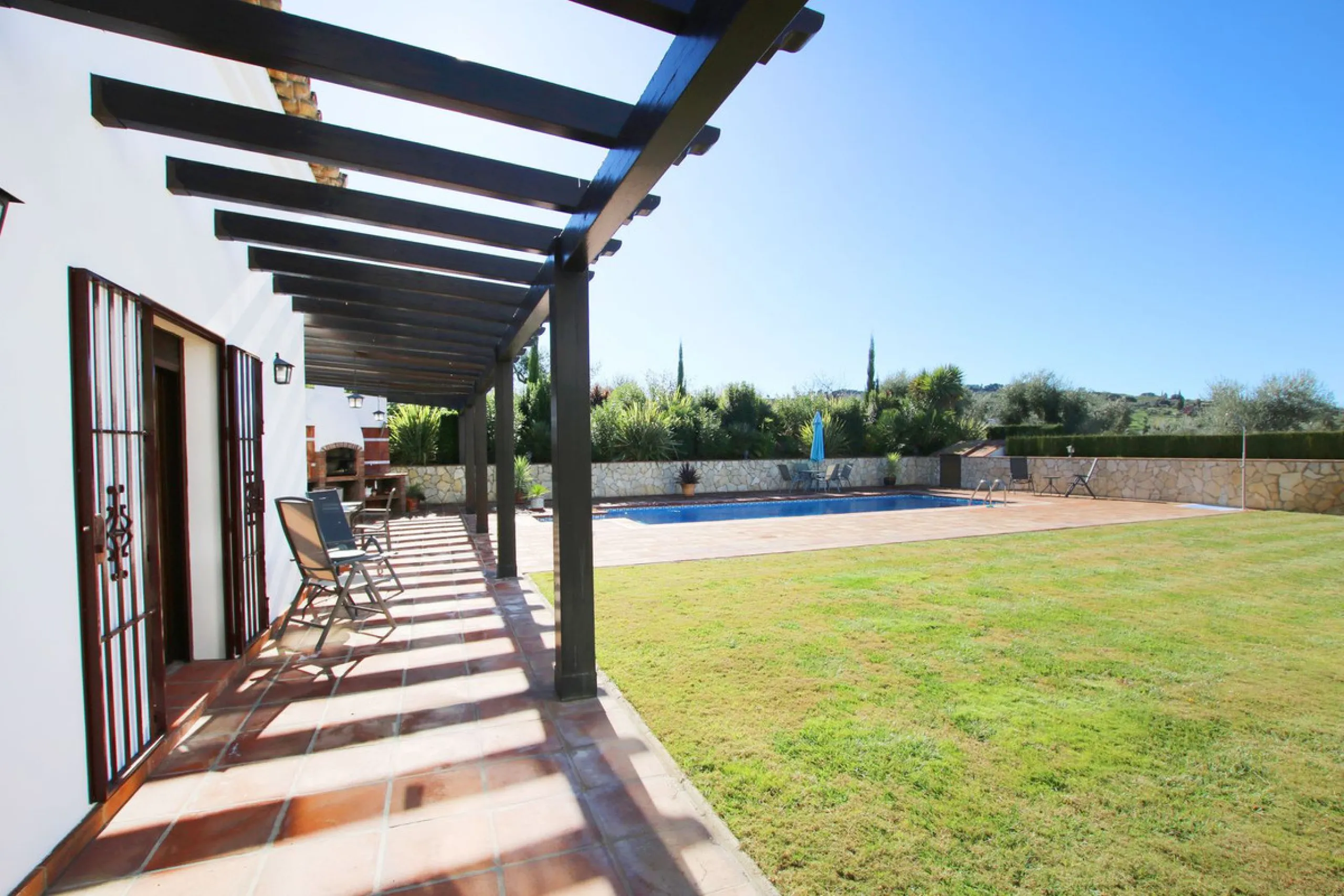 Classical Andalucian inspired country villa situated within the much sort after area of Llano del Cruz just 5 minutes drive outside the vibrant and historic town of Ronda , Southern Spain.