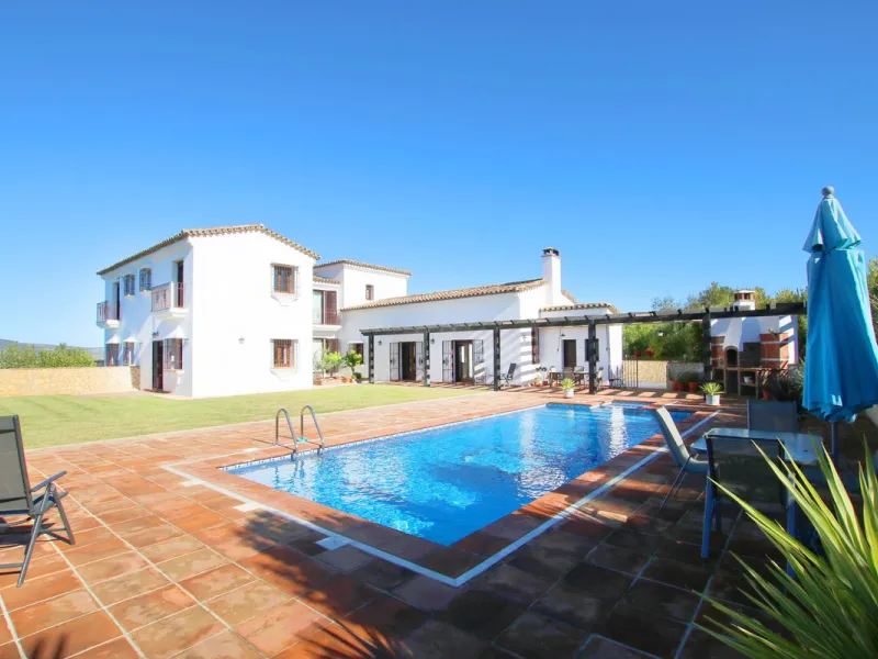 Classical Andalucian inspired country villa situated within the much sort after area of Llano del Cruz just 5 minutes drive outside the vibrant and historic town of Ronda , Southern Spain.
